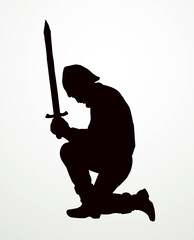 Kneeling knight with a sword. Vector drawing