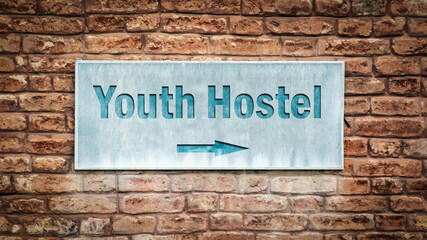 Obraz premium Street Sign to Youth Hostel