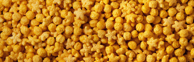 Set of corn flakes. Background and texture. Panorama.