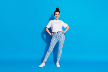 Full length body size view of nice attractive pretty content cheerful cheery girl posing wearing season outfit look clothing collection isolated over bright vivid sine vibrant blue color background