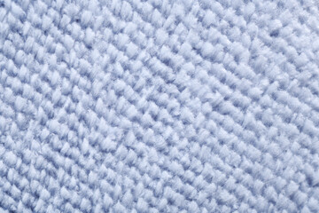 Wool blue fabric texture.Full frame details of loop pile blue carpet texture background.