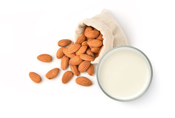 Flat lay (top view) of Almond milk with almond seed isolated on white background.