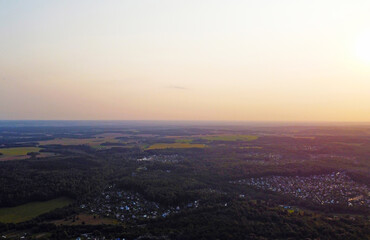 Beautiful top view of a forest landscape with green trees near the suburb