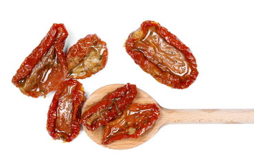 Oiled sun-dried tomatoes with wooden spoon isolated on white background, top view
