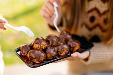 sweet dessert eaten outside with forks in the park