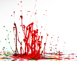 Splash of color ink or paint on white background