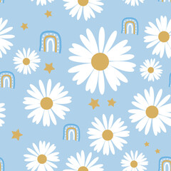Obraz premium Seamless pattern with daisy flower and rainbow on blue background vector.
