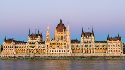 Fototapeta na wymiar Hungarian Parliament Building at dusk from across the Danube river, Budapest, Hungary