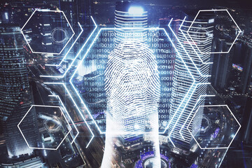 Double exposure of finger print hologram and cityscape background. Concept of personal security.