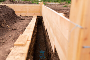 Wooden formwork for new house strip foundation