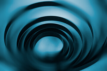 Espiral de metal con efectos de desenfoque en tonalidad azul