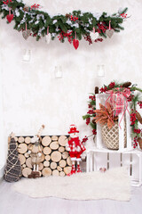 Christmas room with a toy snowman, Christmas tree pendant with hearts, red berries and cones