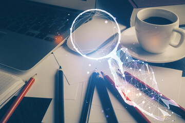 Desktop computer background in office and start up theme hologram drawing. Double exposure. Startup...