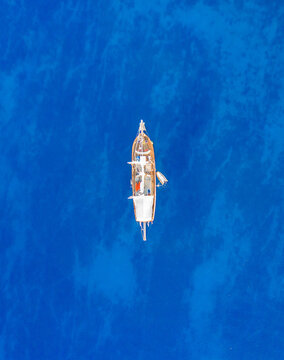 View of a boat from top in Mediterranean Sea...