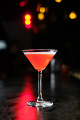 Making cocktails at home like an expert nightclub barman. Fresh and juicy colorful homemade cocktails at bar counter.