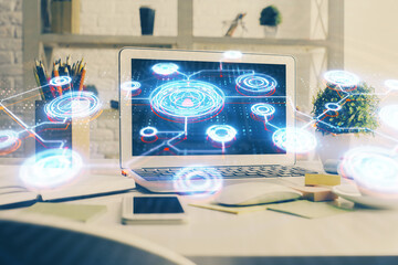 Computer on desktop with social network hologram. Multi exposure. Concept of international people connections.