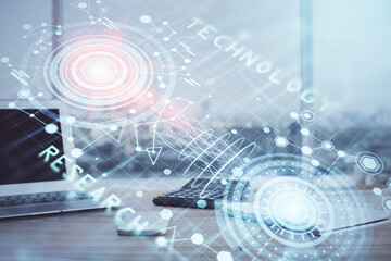 Double exposure of desktop computer and technology theme hologram. Concept of software development.