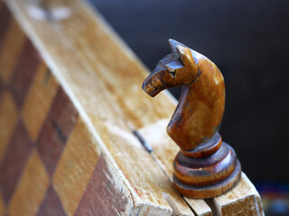 Wooden chess knight and Board © sabdiz