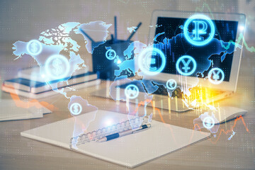 Financial graph colorful drawing and table with computer on background. Double exposure. Concept of international markets.