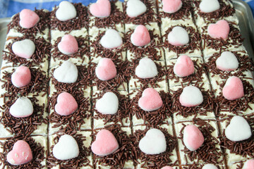 Black forest cake with pink love topping