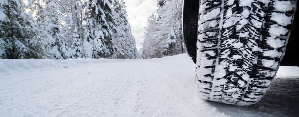 wintertyres on snow covered road