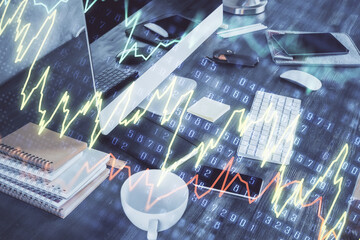 Double exposure of graph and financial info and work space with computer background. Concept of international online trading.