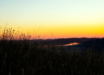 Majestic sunrise in the mountains landscape, beautiful dawn with fog
