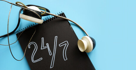 24 7 customer service and support concept and retro headset.