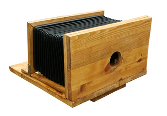 An homemade imitation of an old photo camera made of wooden boards isolated