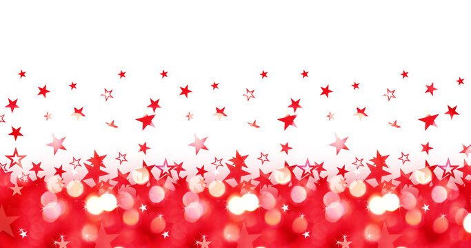 Shiny panoramic christmas holiday background of red lights with stars isolated on white