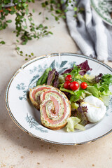 delicious breakfast with zucchini smoked salmon roulade