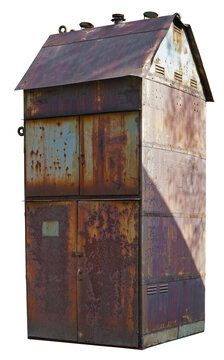 A tall firewood storage shed made of rusty transformer boxes isolated