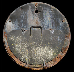 Round hatch of the firebox of a small old steam locomotive isolated