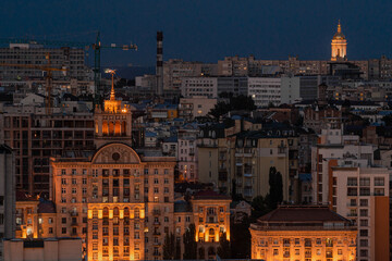 Naklejka premium View of Lipki, Kiev. Stalin's house with a star, the bell tower of the Kiev Pechersk Lavra, workshops of the Arsenal plant. Aerial shot