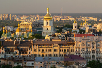 Fototapeta na wymiar Saint Sophia Cathedral, Kiev. In the foreground - the old town, in the background - Troyeshchina and CHPP-6. Aerial shot