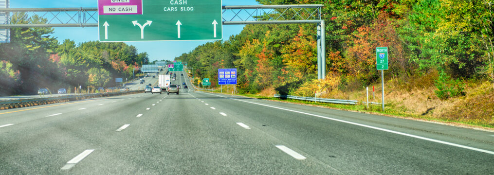 HOOKSETT, NH - OCTOBER 8, 2015: New England interstate signs in foliage season