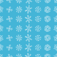 Seamless background of hand drawn snowflakes