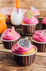 Happy Halloween cupcakes decorated cream and chocolate