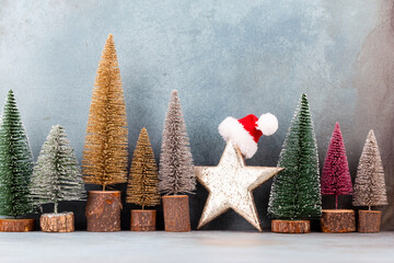 Colorful Christmas tree on blue background.
