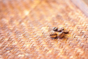 Roasted Arabica coffee Beans on bamboo basket