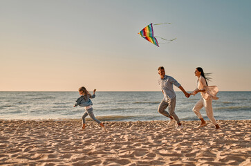 Happy family on the beach