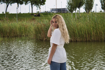 blonde girl posing in the park