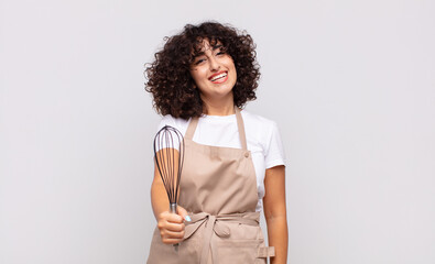 arab pretty woman chef wearing an apron. - obrazy, fototapety, plakaty