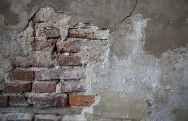 old brick wall with cracks