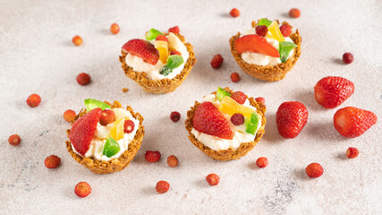 Oatmeal cooked baskets with cottage cheese and fruits. Healthy breakfast oatmeal cups. Romantic food. Cook at home