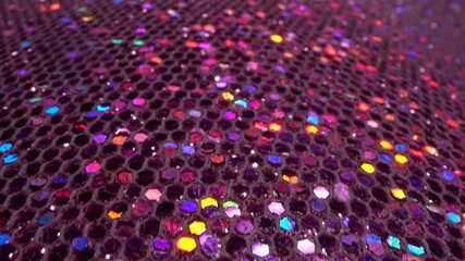 Beautiful pink purple blue glitter holiday texture in motion. Festive shiny decorative surface - Powered by Adobe