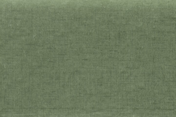 Vintage and old looking paper background. Colored green retro book cover. Ancient book page.