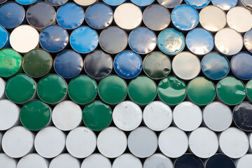 used chemical steel containers. oil metal drums. recycle steel barrels background and texture.