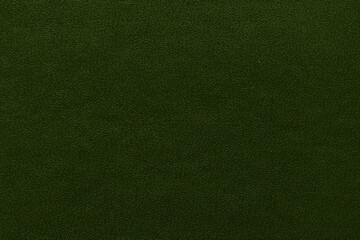 Vintage and old looking paper background. Colored green retro book cover. Ancient book page.