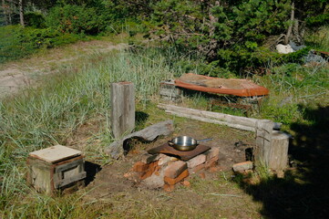 cooking freshly caught cod in the open air